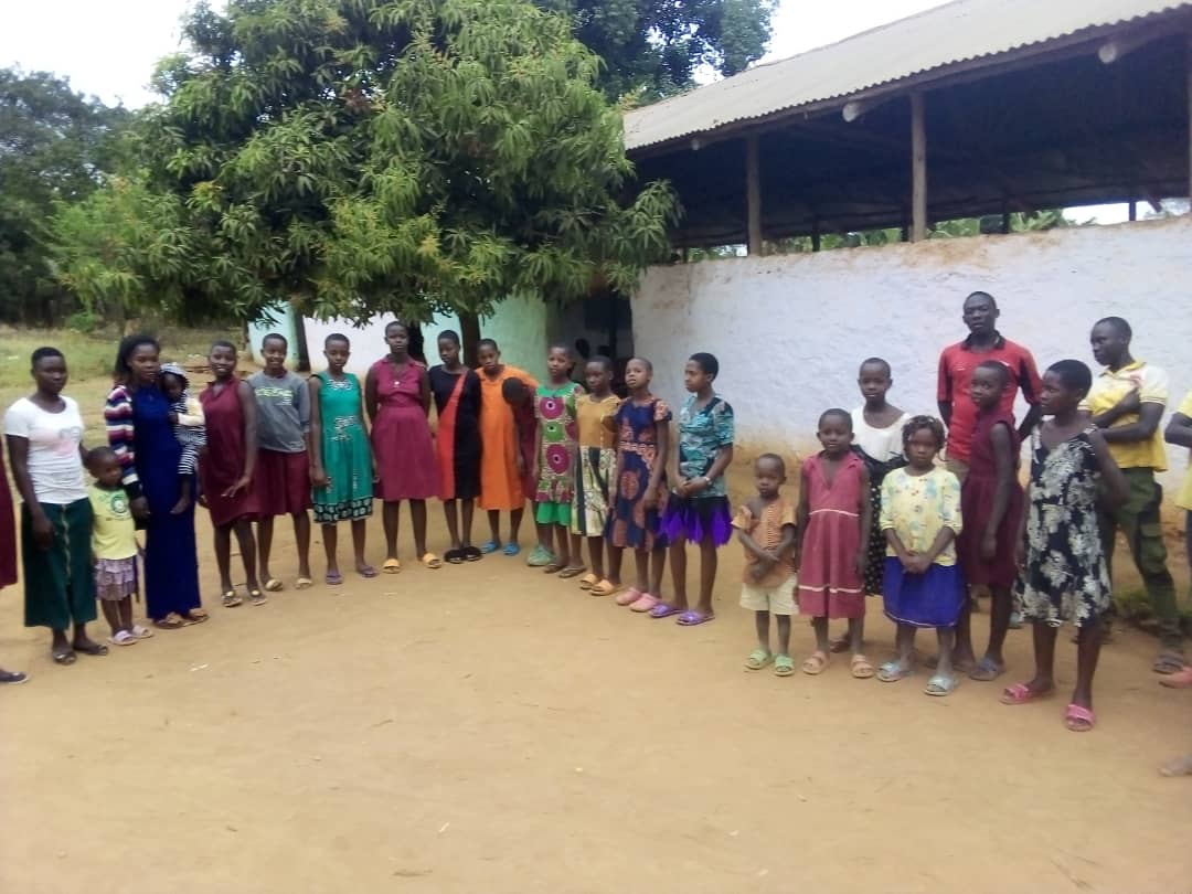 Divinembassy supported chhildren in a compound